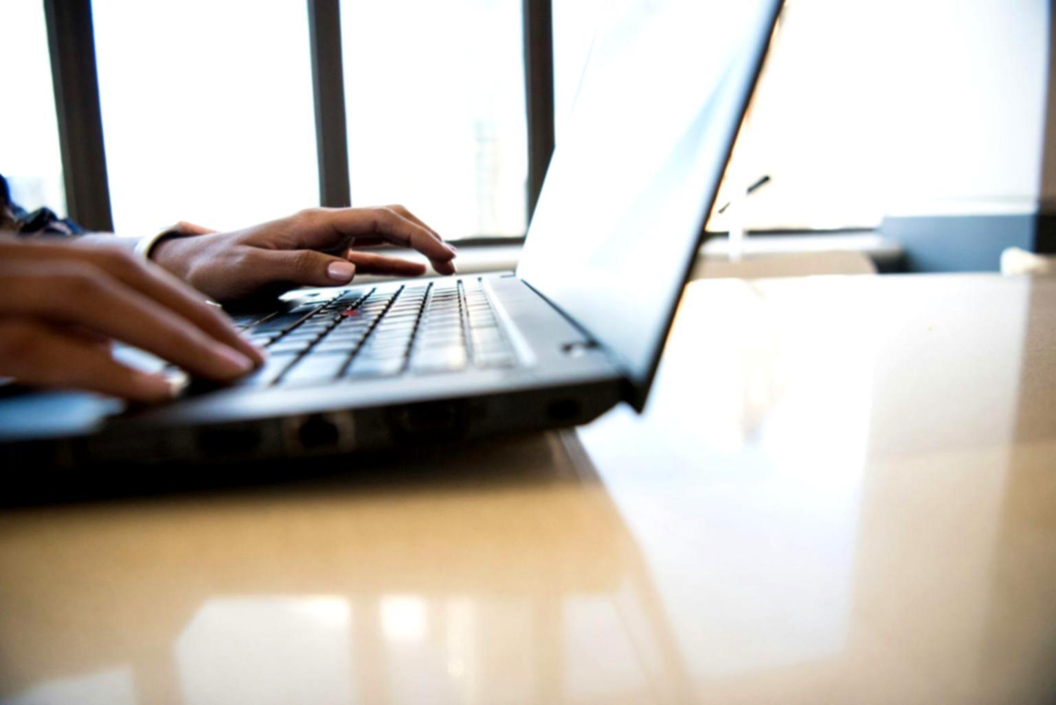 Financial professional reviewing budget documents and audit preparation materials